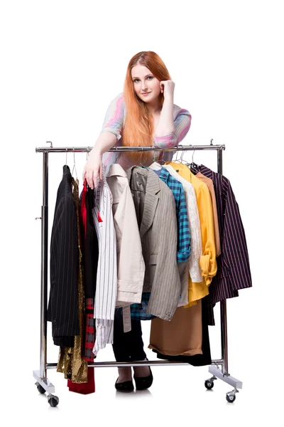 Mujer eligiendo ropa en tienda aislada en blanco — Foto de Stock