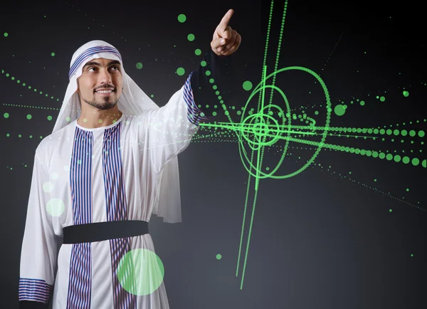 Arabische man virtuele knoppen in te drukken in futuristische concept — Stockfoto
