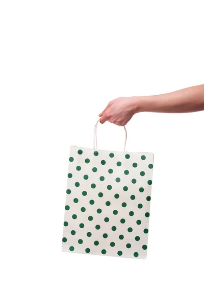 Hand holding giftbag isolated on white — Stock Photo, Image