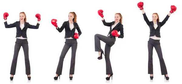 Femme d'affaires avec gants de boxe sur blanc — Photo