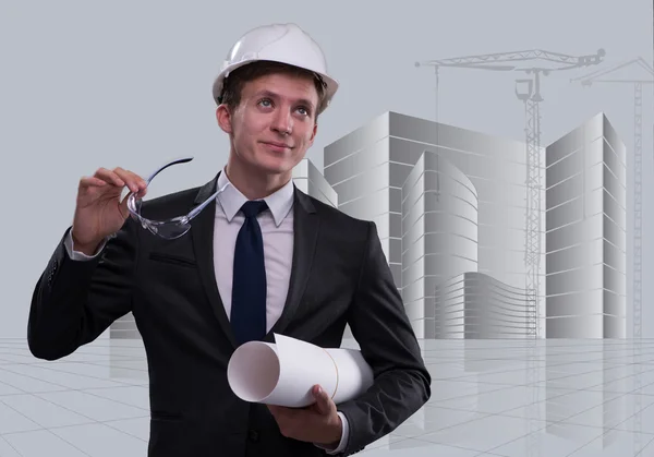 Young architect with drawings in composite concept — Stock Photo, Image