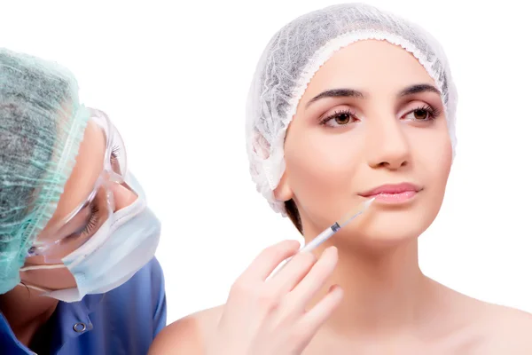 Young woman preparing for plastic surgery isolated on white — Stock Photo, Image