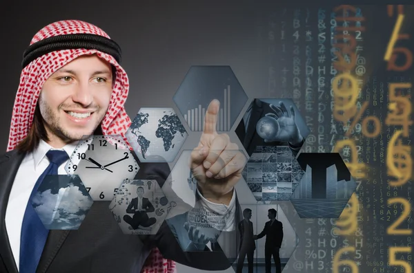 Arab businessman pressing virtual buttons — Stock Photo, Image