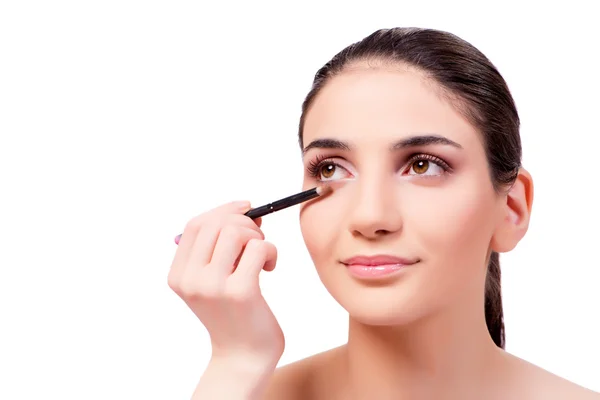 Schöne Frau während der Make-up-Kosmetik-Sitzung — Stockfoto