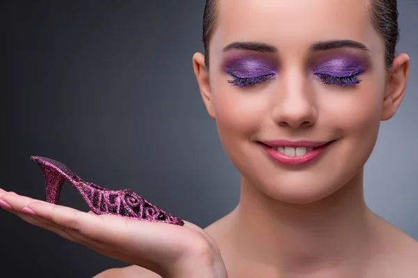 Young woman with purple show in fashion concept — Stock Photo, Image