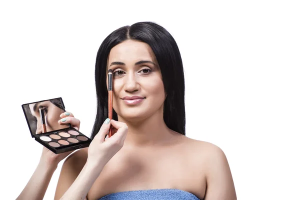 Mladá žena se make-up izolovaných na bílém — Stock fotografie