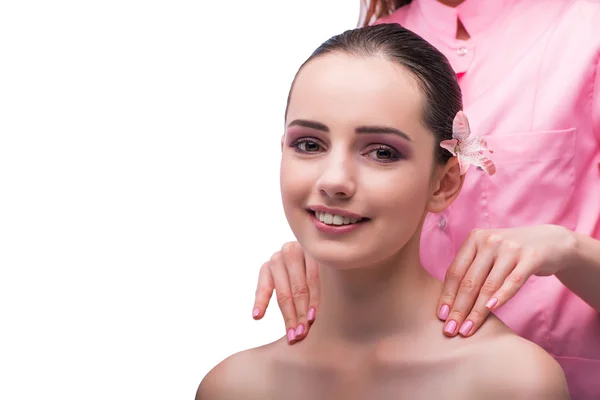 Beautiful young woman during face massage session — Stock Photo, Image