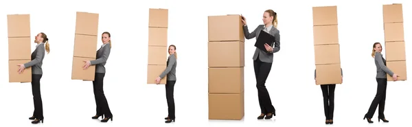 Imagen compuesta de mujer con cajas en blanco — Foto de Stock