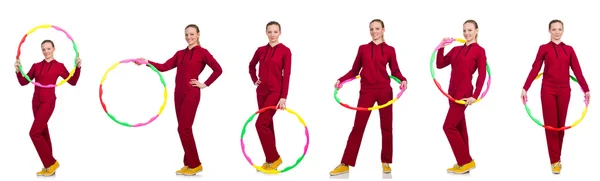 用呼啦圈做运动的妇女 — 图库照片