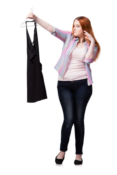 Kvinnan att välja kläder i butik isolerad på vit — Stockfoto