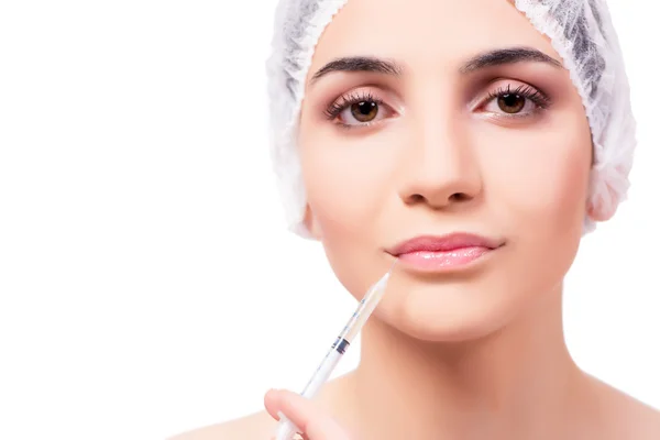 Young woman preparing for plastic surgery isolated on white — Stock Photo, Image