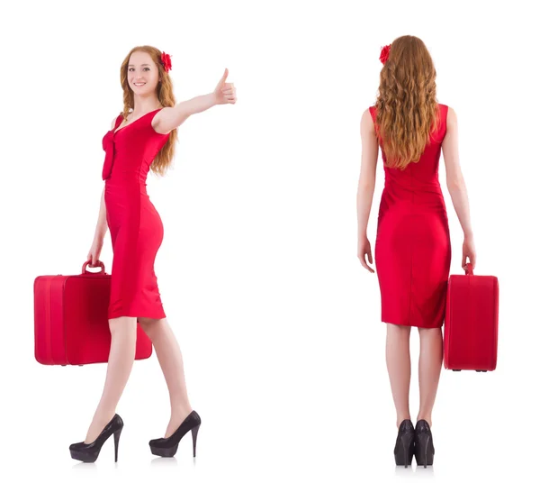 Jovem em vestido vermelho com mala isolada em branco — Fotografia de Stock