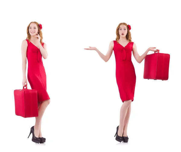 Çanta üzerinde beyaz izole Kırmızı elbiseli genç kadın — Stok fotoğraf