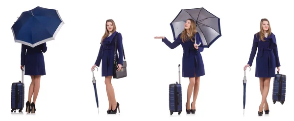 Mulher com mala e guarda-chuva isolado em branco — Fotografia de Stock