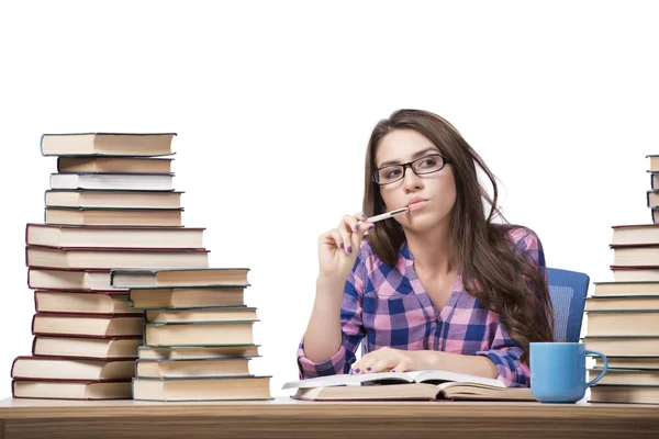 Joven estudiante preparándose para los exámenes de la universidad aislado en blanco —  Fotos de Stock