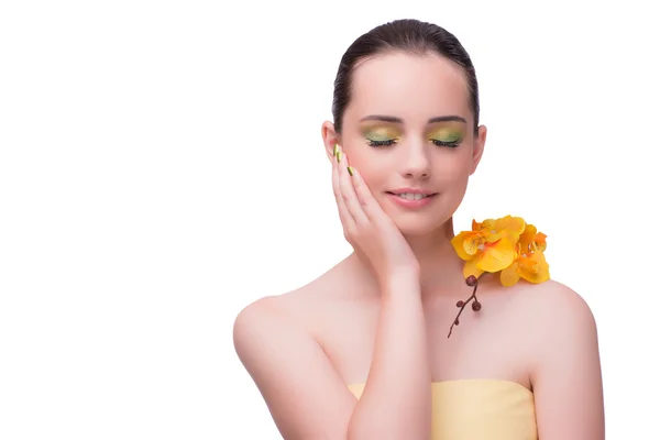 Mujer joven con flor de orquídea aislada en blanco —  Fotos de Stock