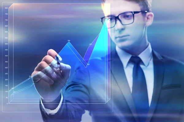Businessman working with graph in business concept — Stock Photo, Image