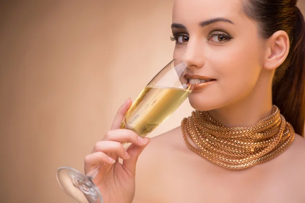 Young woman with champagne glass Royalty Free Stock Photos