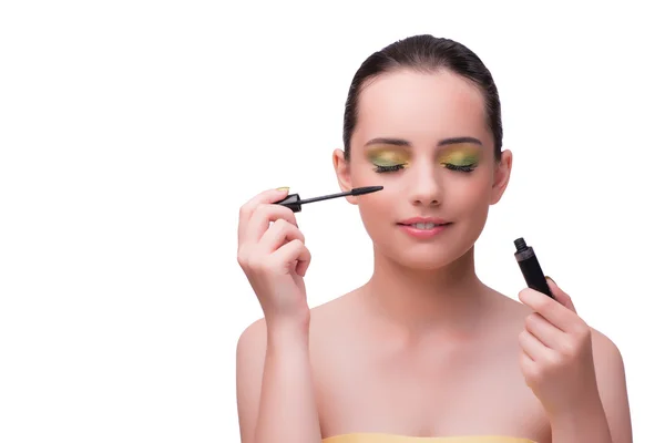 Mladá žena během relace make-up izolované na bílém — Stock fotografie