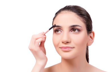 Kalıcı makyaj kozmetik oturumu sırasında güzel kadın