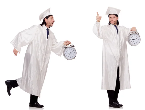 Jeune homme étudiant avec horloge isolé sur blanc — Photo