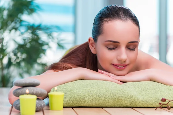 Young beautiful woman during spa procedure