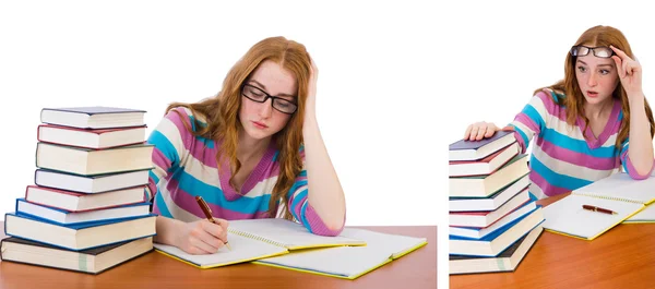 Junge Studentin mit Büchern auf Weiß — Stockfoto