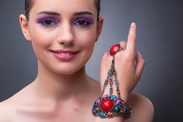 Beautiful woman with jewellery in fashion concept — Stock Photo, Image