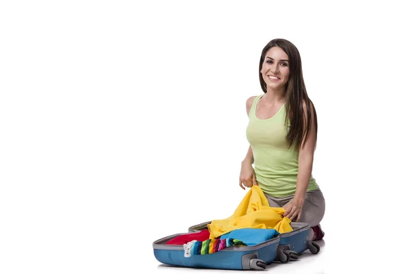 Embalaje de mujer preparándose para vacaciones de verano aislado en blanco — Foto de Stock