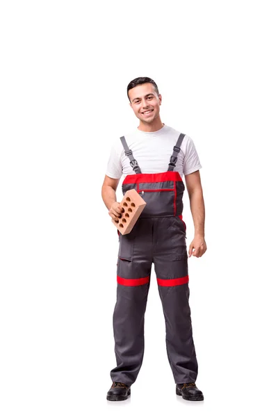 Young worker with brick isolated on white — Stock Photo, Image