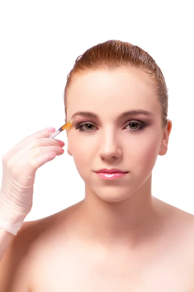 Jovem se preparando para o tratamento facial isolado em branco — Fotografia de Stock