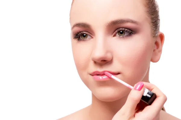 Vacker kvinna under smink kosmetika session — Stockfoto