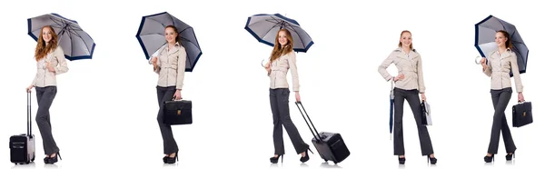 Mujer joven viajando con maleta y paraguas aislado en wh —  Fotos de Stock