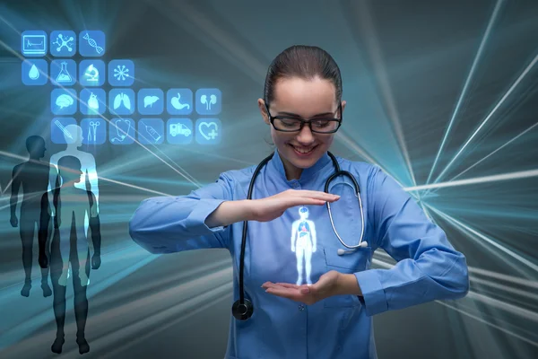 Woman doctor pressing buttons with various medical icons — Stock Photo, Image