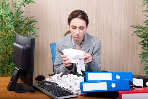 Busy businesswoman in the office under stress — Stock Photo, Image