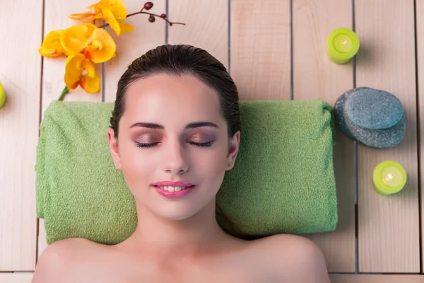 Young beautiful woman during spa procedure