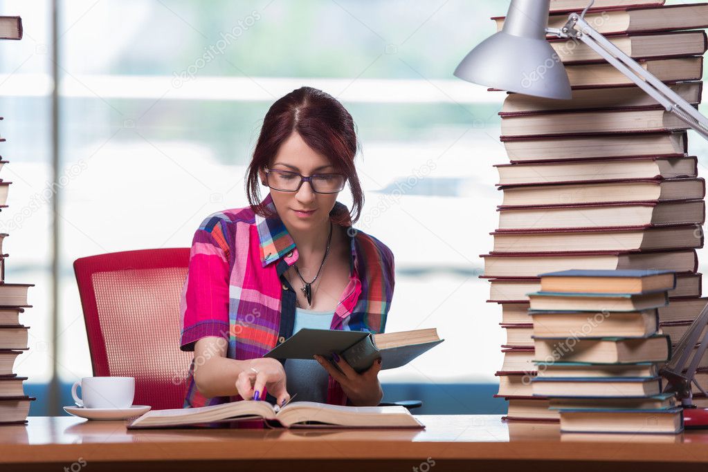 Young woman student preparing for college exams