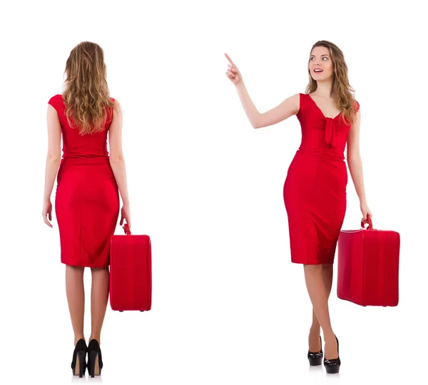 Młoda kobieta w czerwonej sukience z walizką na białym tle — Zdjęcie stockowe