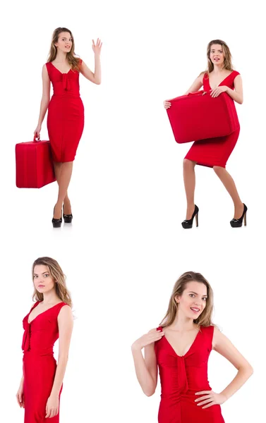 Young woman in red dress with suitcase isolated on white — Stock Photo, Image