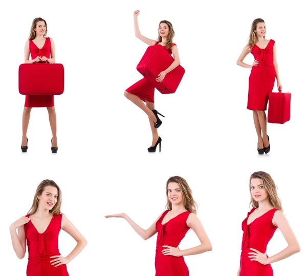 Young woman in red dress with suitcase isolated on white — Stock Photo, Image