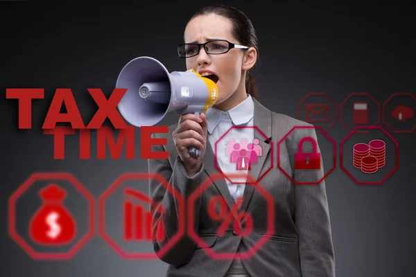 Businesswoman in business tax concept — Stock Photo, Image