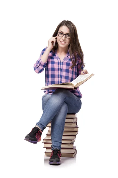 Joven estudiante preparándose para los exámenes de la universidad aislado en blanco —  Fotos de Stock