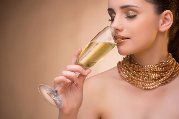 Young woman with champagne glass Stock Image