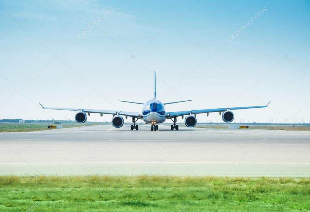 Large airplane on the runway ready for takeoff