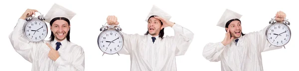 Jeune homme étudiant avec horloge isolé sur blanc — Photo