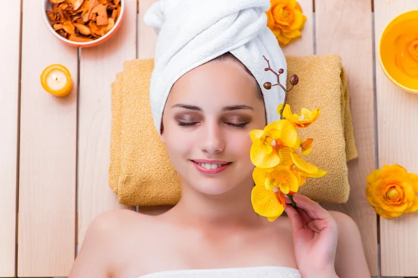 Young woman in spa health concept