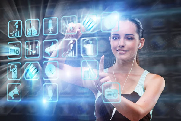Young girl in sports concept pressing virtual buttons — Stock Photo, Image