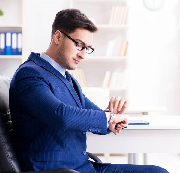 Young handsome businessman employee working in office at desk — Stock Photo, Image