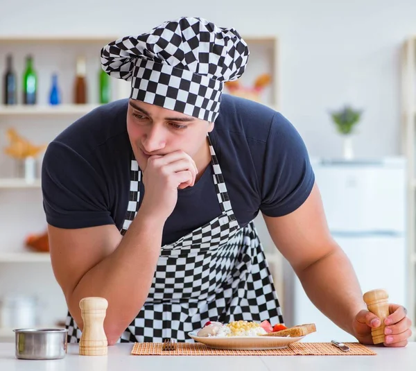 Chef cook cooking a meal breakfast dinner in the kitchen — Stock Image Chef cook cooking a meal breakfast dinner in the kitchen Stock Image