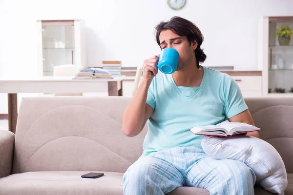 Young male student preparing for exams at home — Stock Photo, Image